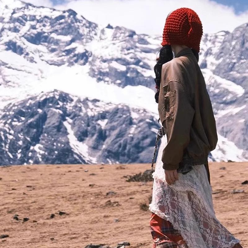 Autumn And Winter Warm Wool Hat Hand-Woven Hollow Bag Hat Women'S Ethnic Style Fringed Ear Protector Knitted Hat