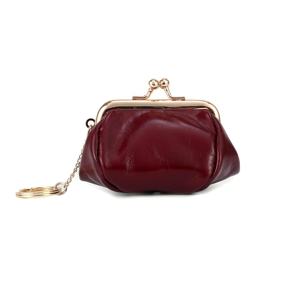 Retro clip change bag women's European and American, first layer oil wax cowhide Ins small earphones coin bag storage bag