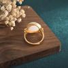 Copper-Plated Retro Court Style Ring with Imitation Mutton Fat White Jade