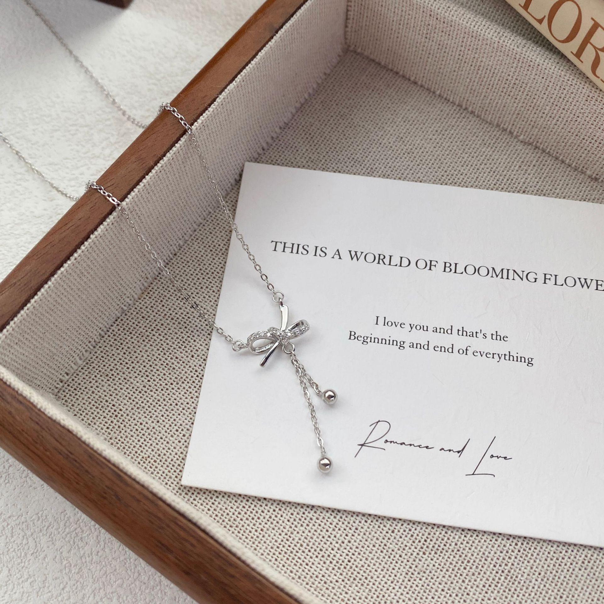 Sterling Silver Bow Tassel Clavicle Necklace for Women - Elegant, Luxurious, and Exquisite Accessory Sterling Silver