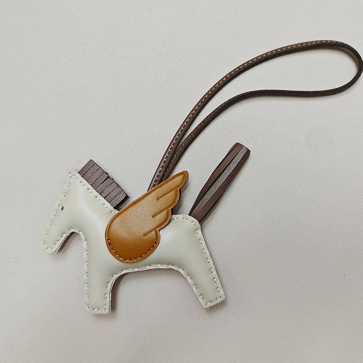 Håndsømmet Ekte Skinn Pony Veskeanheng - Søtt Lammeskinn Flygende Hest Design