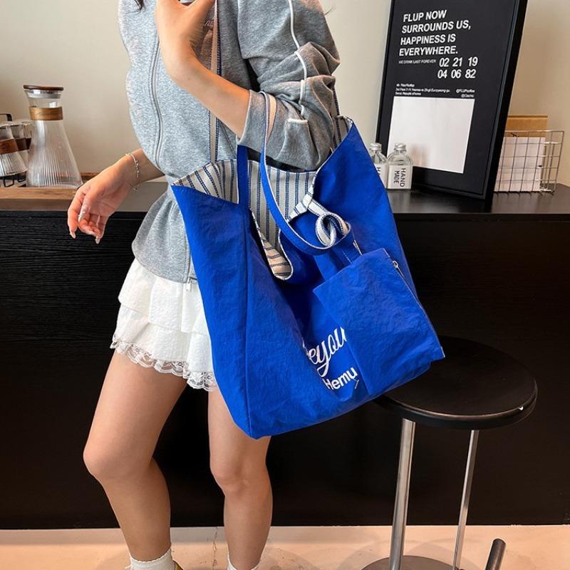 Literary and artistic plaid double-sided shoulder bag, new simple college student commuting portable tote bag