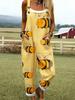 Green jumpsuit with cartoon bee pattern