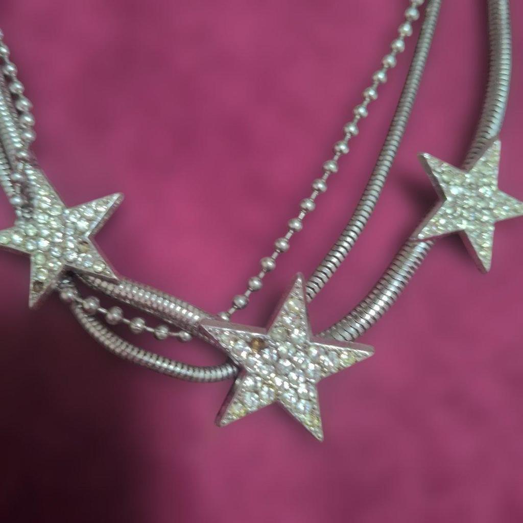Used Star motif 3-strand necklace silver color