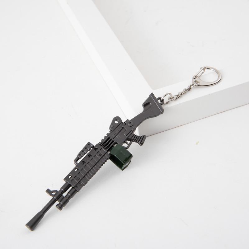 

«Хит продаж: игрушечная металлическая модель автомобиля и брелок для выживания»