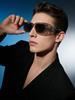 Prada PR09ZS Transparent Grey Sunglasses, Modern UV400 Shades with Triangle Logo