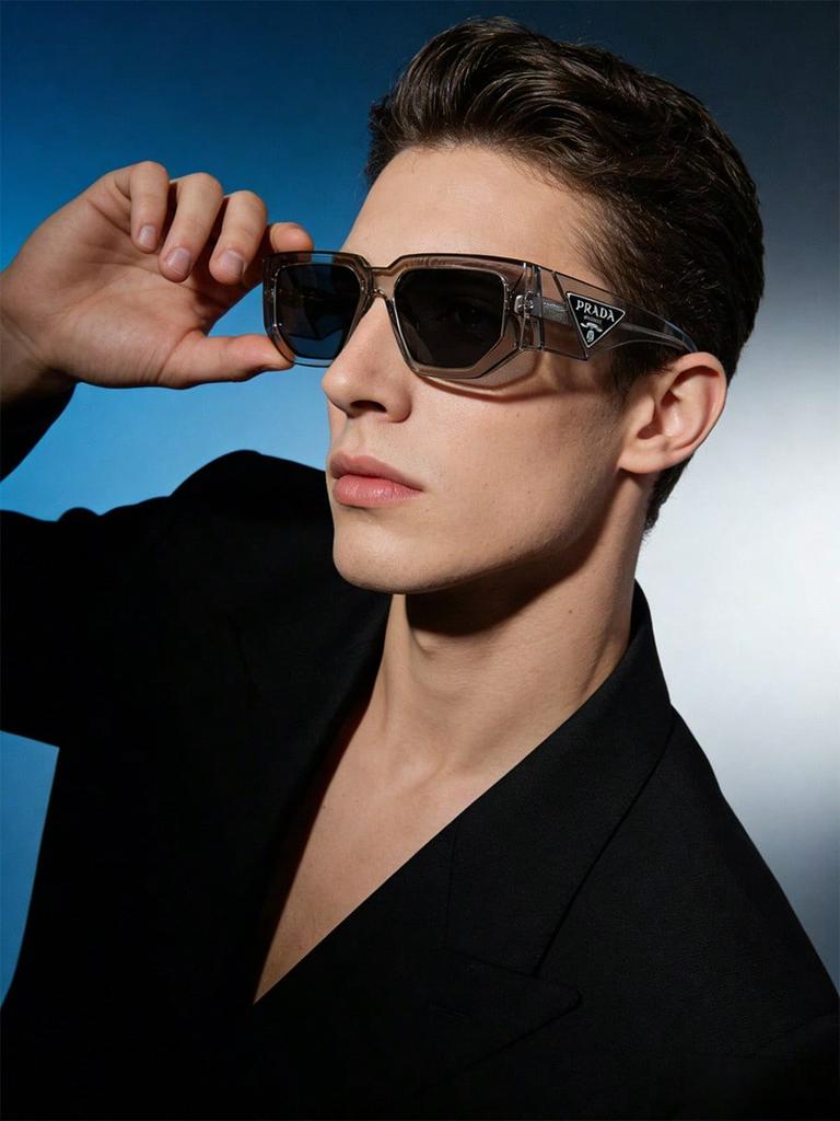 Prada PR09ZS Transparent Grey Sunglasses, Modern UV400 Shades with Triangle Logo