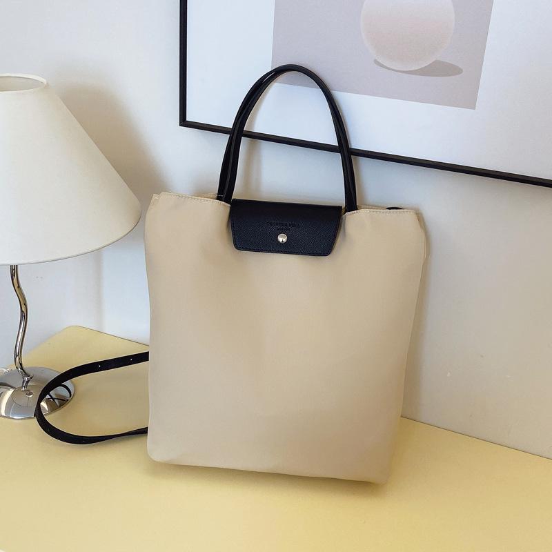 

Сумка женская новая весенне-летняя нишевая нейлоновая на плечо подмышку кроссбоди портативная дорожная сумка-тоут хаки