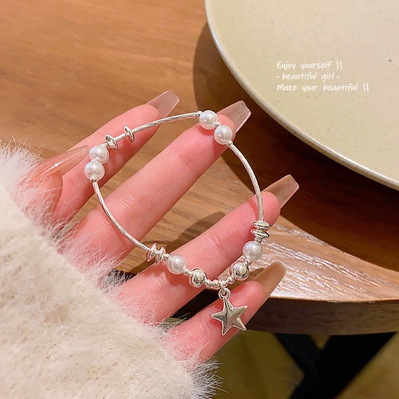 

Элегантный браслет из жемчуга и звезд для женщин — модный, роскошный стиль