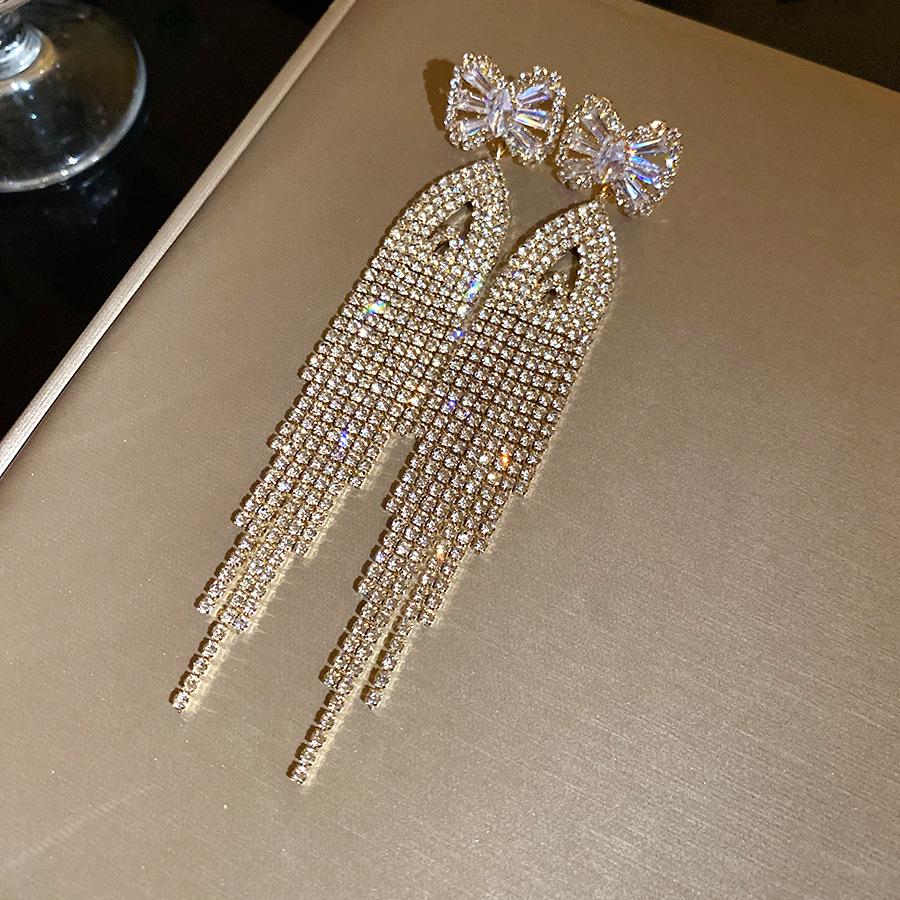 European and American silver needle zircon diamond-encrusted bow fringed earrings simple and fashionable earrings light luxury high-end earrings