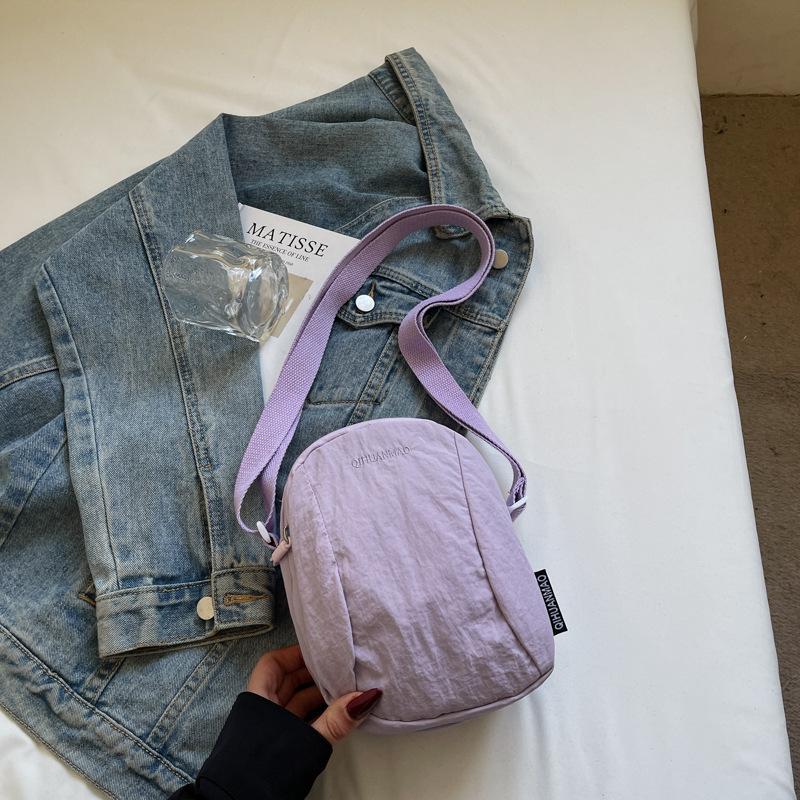 

Versatile small bag Crossbody bag Women s casual canvas bag Light commuter cloth bag Men s mobile phone bag фиолетовый