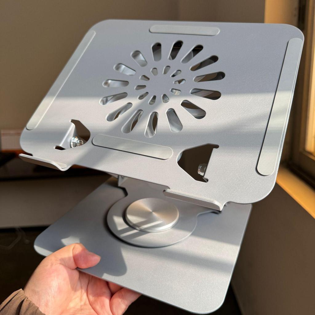 "Verstellbarer 360° drehbarer Laptopständer mit Wärmeableitung und Ablagefach"