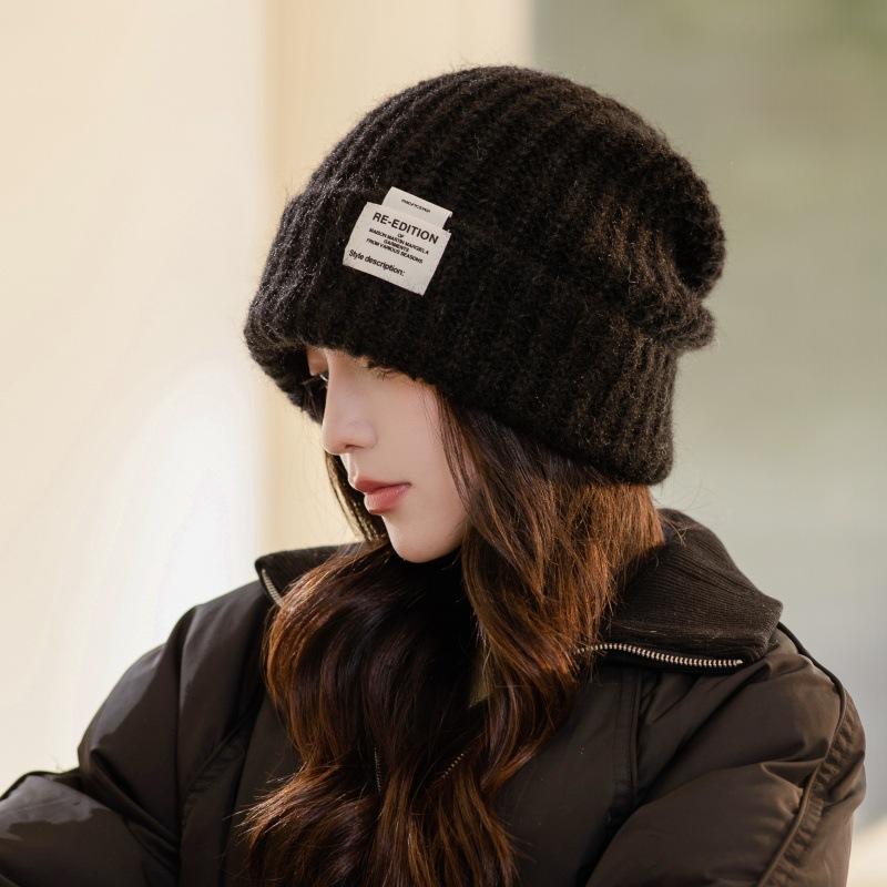 

Hat women s winter big head circumference wool hat shows a small face, fashionable sticker, warm knitted hat, ear protector, and head hat. one size fits all хакі