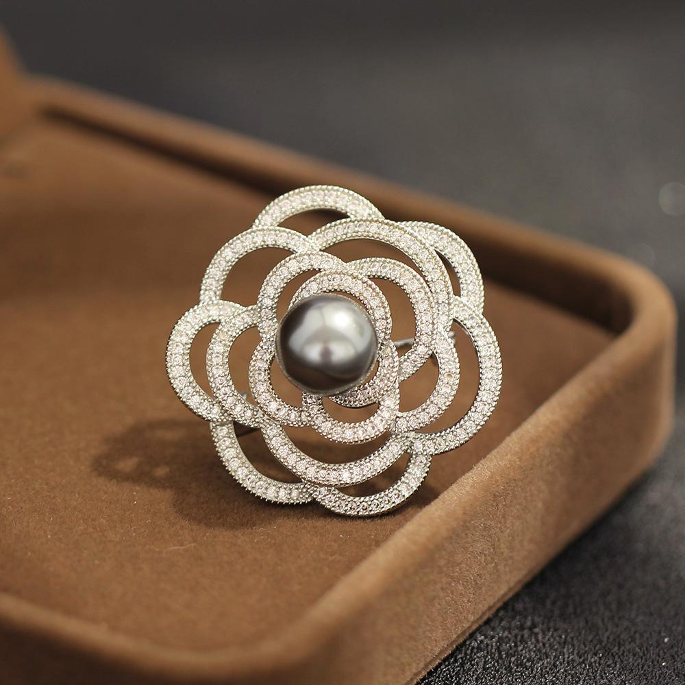 High-class elegant gray pearl camellia brooch light luxury three-dimensional copper alloy micro-inlaid zircon pin versatile clothing
