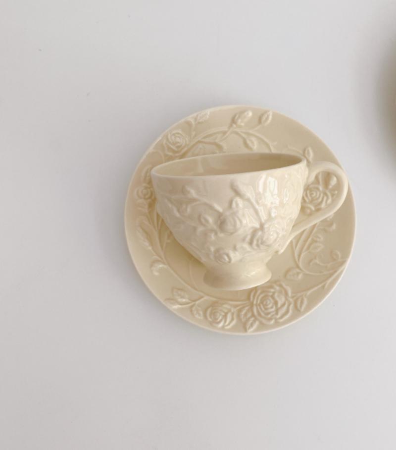 European coffee cups and sauce sets afternoon cups embossed three-dimensional roses creamy yellow ceramic plates