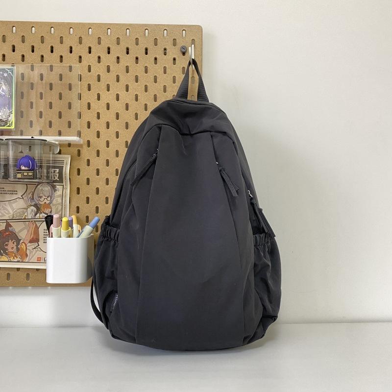 Travel lightweight advanced sense niche backpack college student commuter junior high school girls schoolbag Japanese and Korean simple backpack
