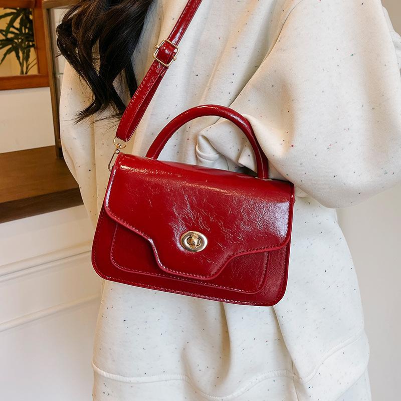 

Premium foreign style handbag women s 2025 new summer simple fashion small bag single room messenger small square bag білий