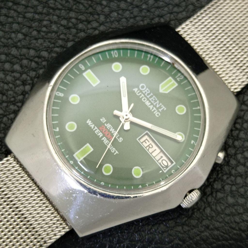 VINTAGE ORIENT AUTOMATIC 46941 JAPAN MENS GREEN COLOR DIAL WATCH A700682-5 R204-a700682