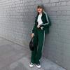 Completo a due pezzi con cappuccio oversize Streetwear da donna con pantaloni a gamba larga a strisce a contrasto
