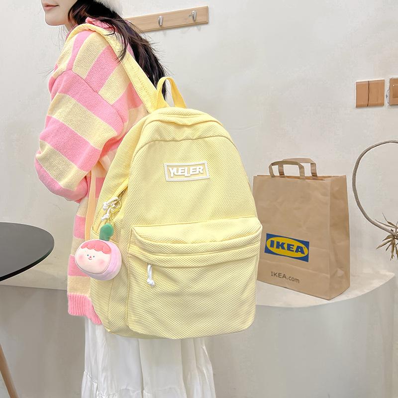 Student backpack Women's new large-capacity outdoor lightweight schoolbag Middle school student candy-colored backpack