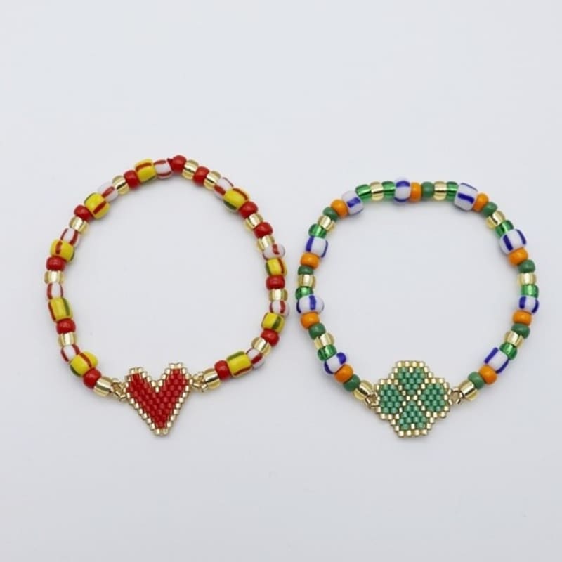 

Браслет з намистин-сердечок та конюшинок green