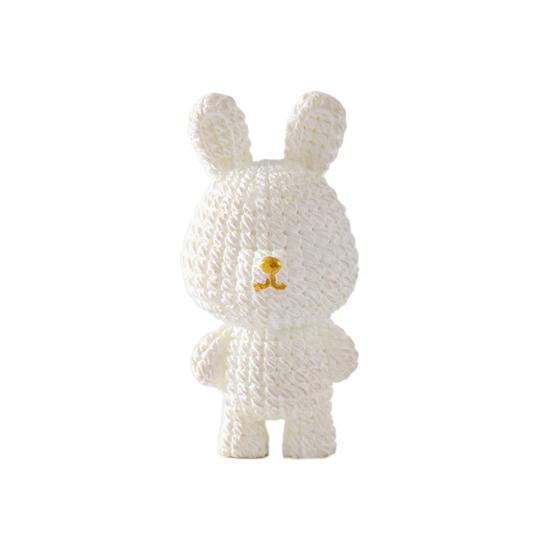 

Симпатичная фигурка кролика, яркий цвет, настольный микропейзажный орнамент белый