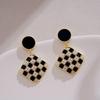 Elegant Gold-Plated Black Zircon Stud Earrings - Niche Design for a Luxurious Fashion Statement
