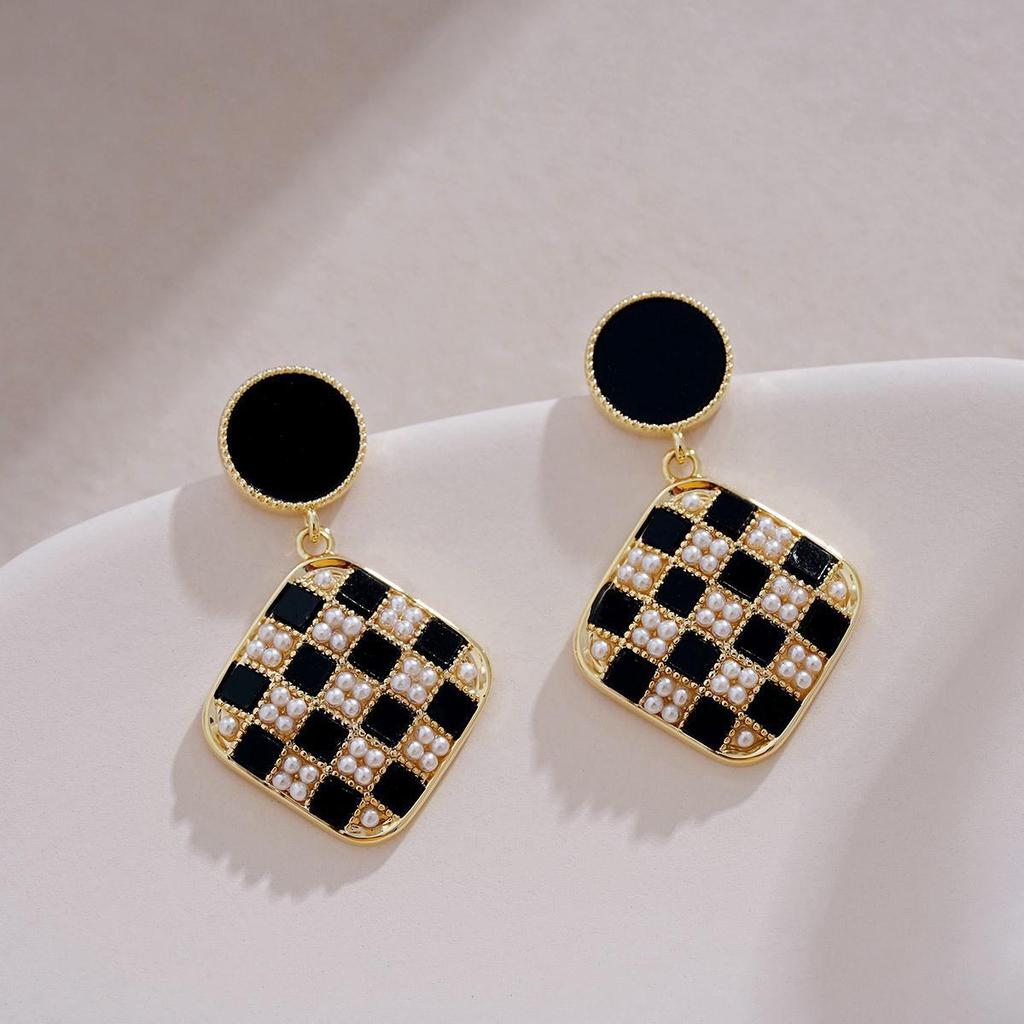 Elegant Gold-Plated Black Zircon Stud Earrings - Niche Design for a Luxurious Fashion Statement