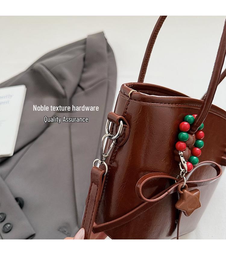 Innovative Sense Kleine Bucket Bag für Damen 2025 - Vielseitige Retro Umhängetasche mit einem Schulterriemen