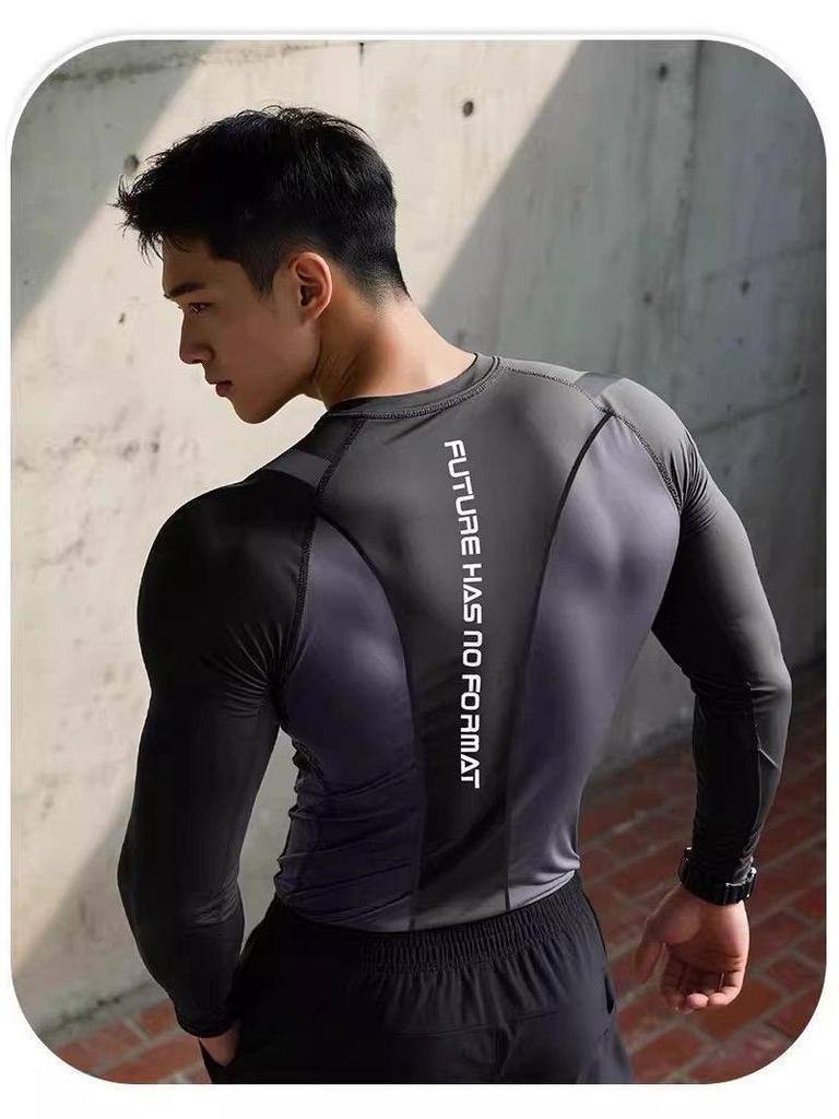 Men's Seamless Fitness Compression Top: Long Sleeve, Quick Dry, Elastic for Muscle Definition.