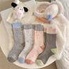 Girls Who Keep Their Feet Warm In Autumn and Winter Can Come Up with Some Warm Woolen Socks. Multicolored Mid-calf Socks Are Versatile for Ladies