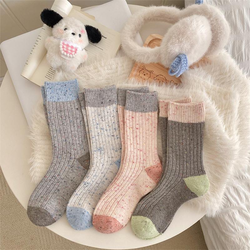 Girls Who Keep Their Feet Warm In Autumn and Winter Can Come Up with Some Warm Woolen Socks. Multicolored Mid-calf Socks Are Versatile for Ladies