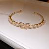 Elegant Zircon Bamboo Crossover Clasp Bracelet - Luxurious & Trendy Hand Jewelry for Women