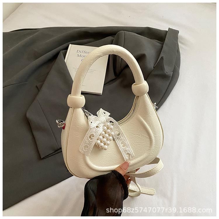 

Premium sense niche bag women s 2025 new spring and summer versatile messenger bag exquisite mini small bag half-moon bag