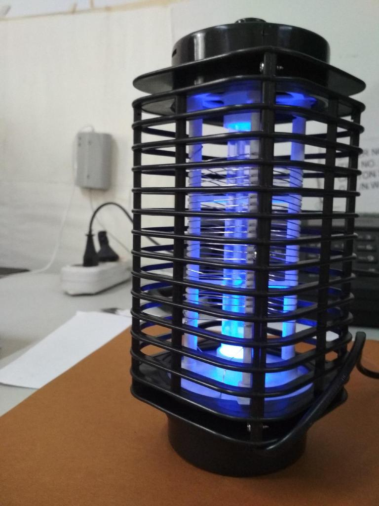 Cross-Border Electric Mosquito Killer Lamp: Household Gift Mosquito Repellent & Fly Catcher with Japanese, American, and European Standard Trapping.