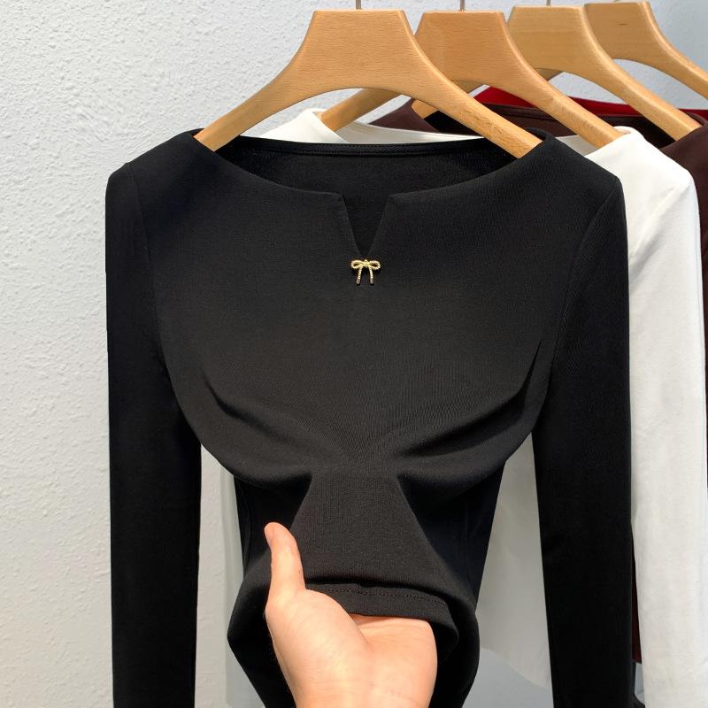 

Thin bottoming shirt women s 2025 new women s clothing temperament one-word shoulder long-sleeved t-shirt retro inner waist top 3XL чёрный