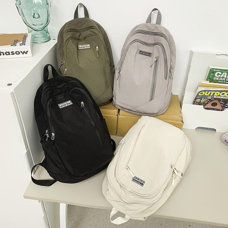 Schoolbag Japanese Simple Casual Backpack Women's Large Capacity Travel Backpack Versatile Student Light Commuter Bag Men's School Bag Tide