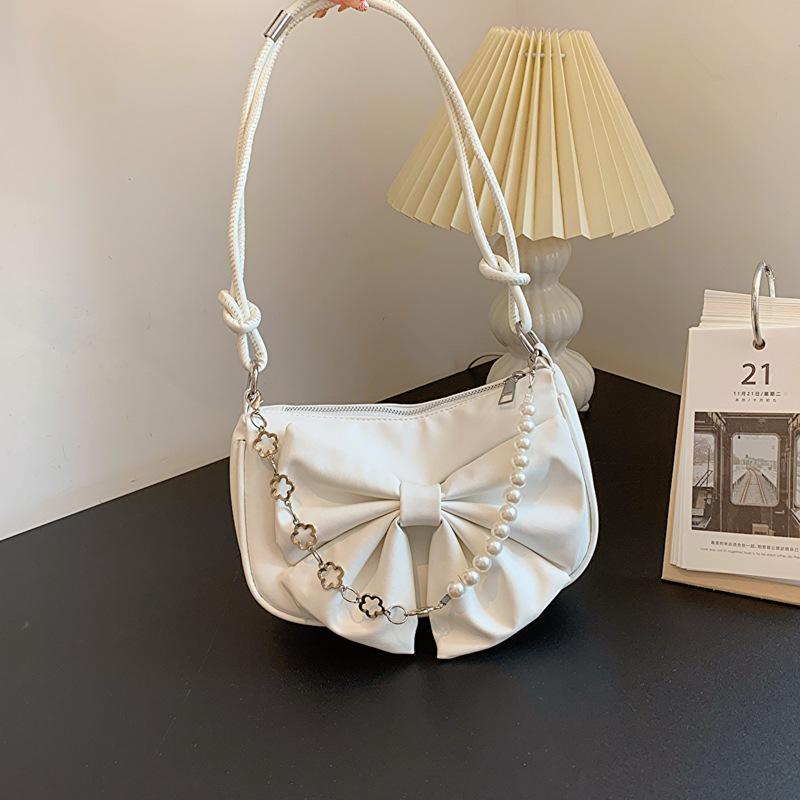 

Simple casual handbag summer popular bag women s bag new niche fashion shoulder armpit bag белый