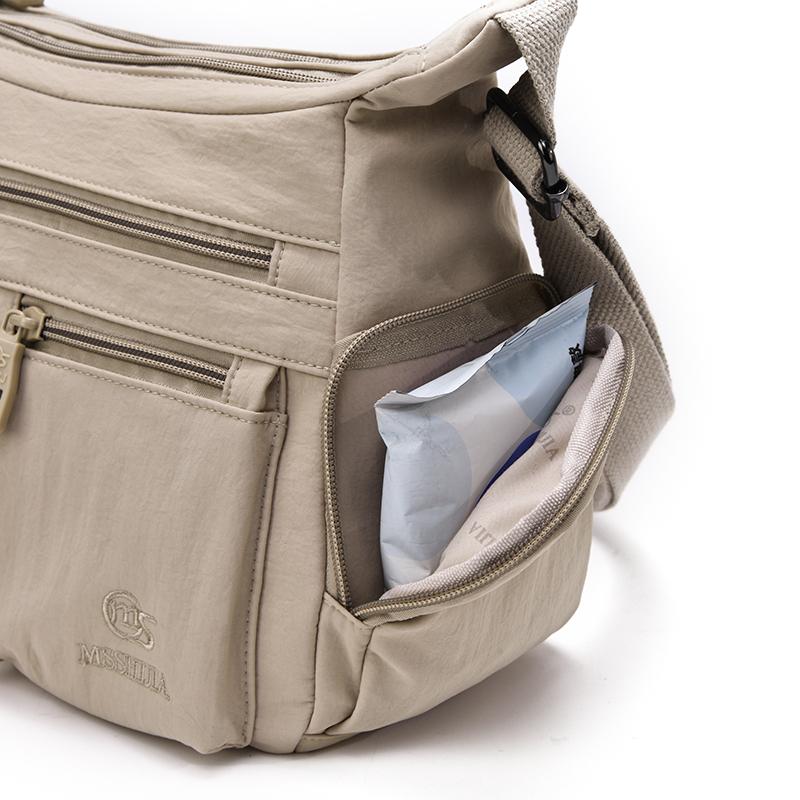 Fashionable Multi Pocket Crossbody Bag with Adjustable Strap and Spacious Design for Daily Use