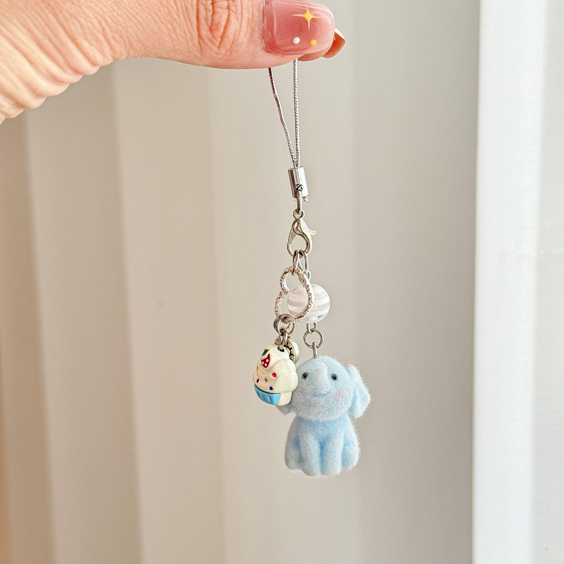 

Синий флокированный слон и подвеска-шарм в виде мороженого