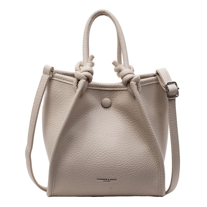 Korean Version of Niche Portable Commuter Bag Women's 2025 New Simple Bucket Bag Versatile Shoulder Cross Wing Bag