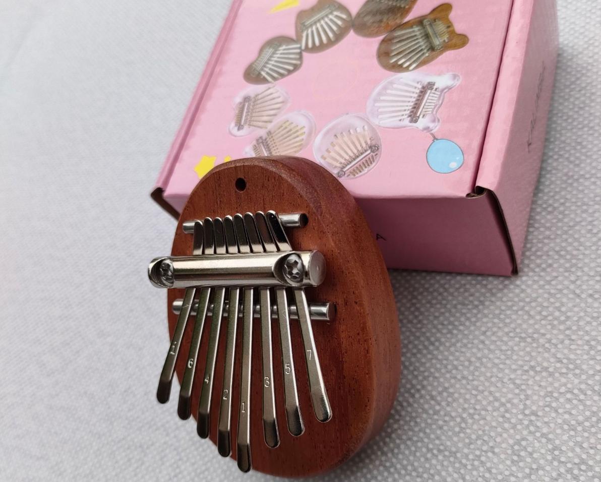 

Мини Калимба 8 Клавиш Фортепиано для большого пальца 1 шт. Стиль капли воды Милый инструмент Портативный Изысканный подарочный набор для детей