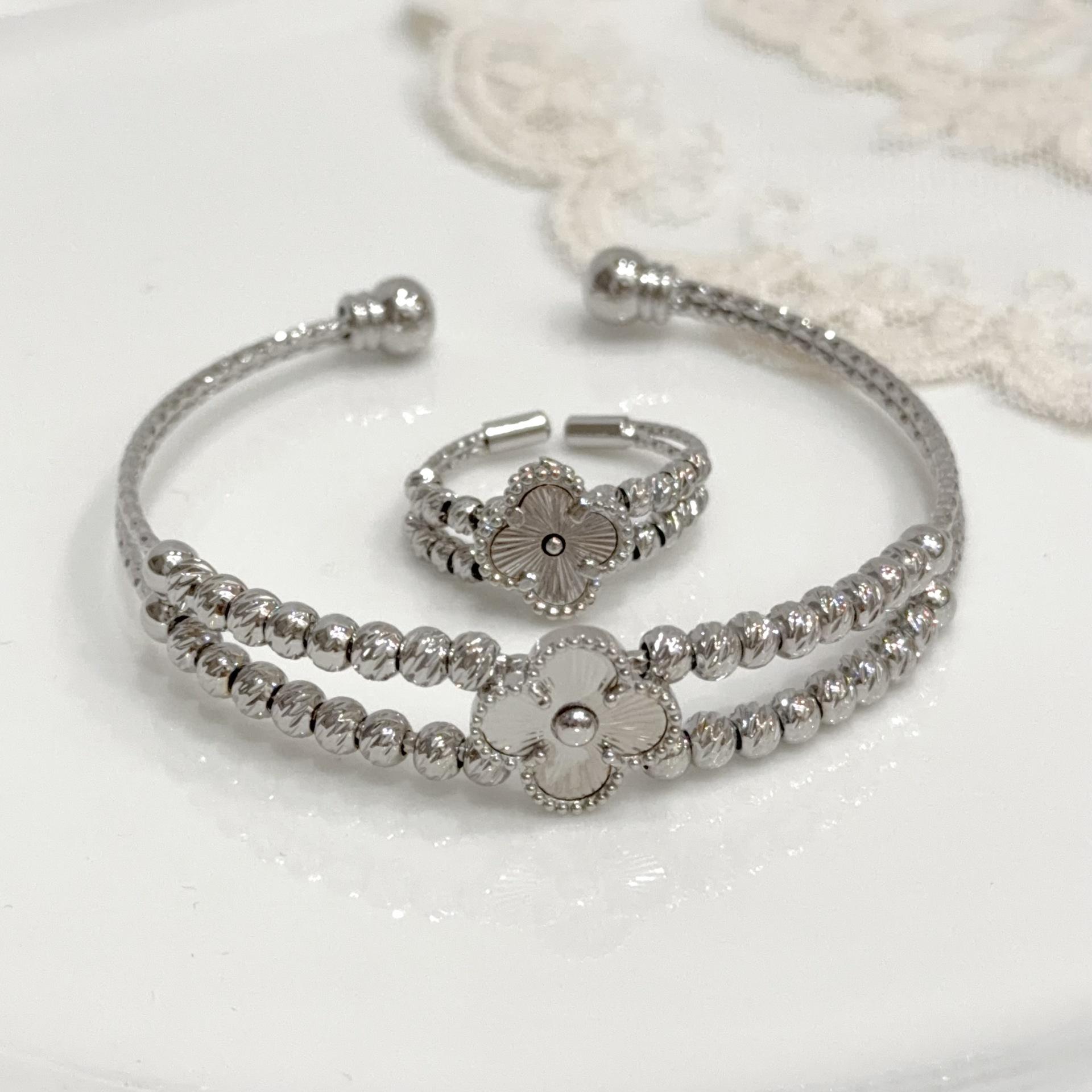 

2 шт. женский высококачественный не тускнеющий ювелирный набор из 18-каратного золота, браслет-кольцо из чистой меди четырехлистный клевер bracelet+ring серебряный