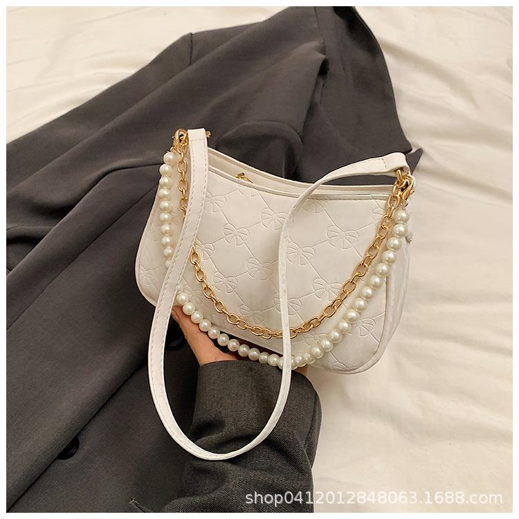 

Сумка-багет на цепочке из искусственного жемчуга в иностранном стиле, женская, новая 2025 года, корейская версия, нишевая сумка-мессенджер, популярная сумка-шоппер через плечо белый