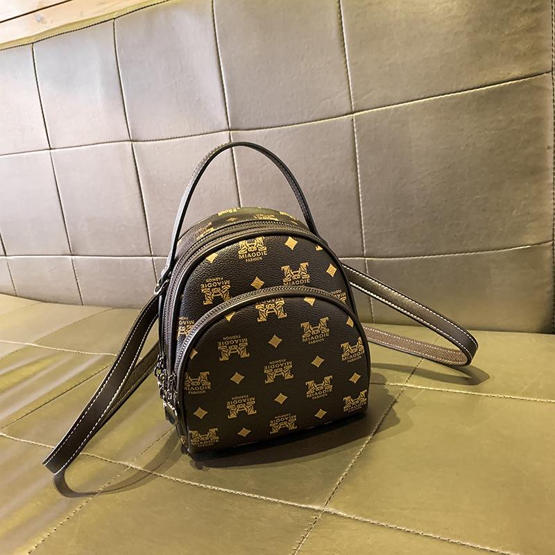 

Маленький рюкзак новый ретро универсальный рюкзак мини многослойная наплечная сумка модная сумка с принтом темно-коричневого