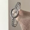 Authentic Jingwei Oval Vintage Women's Quartz Watch with Retro Roman Alloy Bracelet