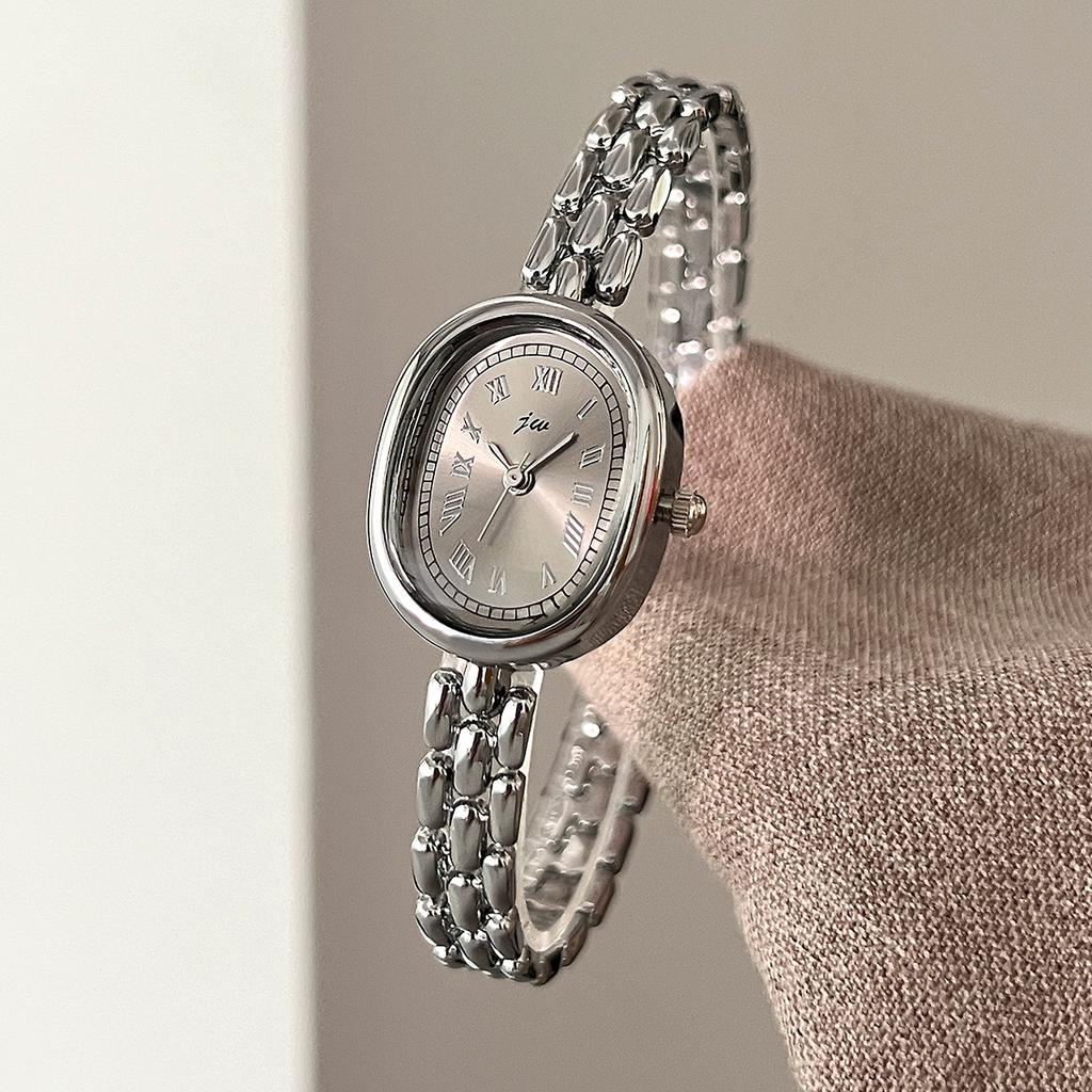 Auténtico Reloj de Cuarzo Ovalado Jingwei Vintage para Mujer con Brazalete Retro Romano de Aleación