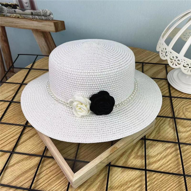 Xiaoxiangfeng flat top elegant straw hat women's spring and summer new beach hat flat brim sun protection wide edge shading versatile top hat tide