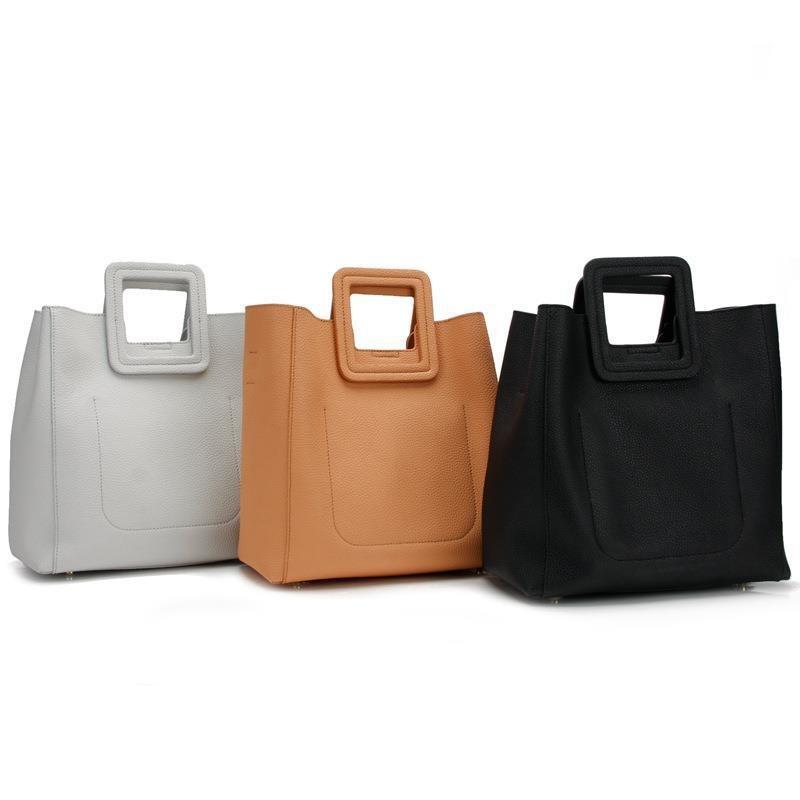 

Design messenger bag geometric commuter splicing handbag ODM niche large capacity handbag OEM