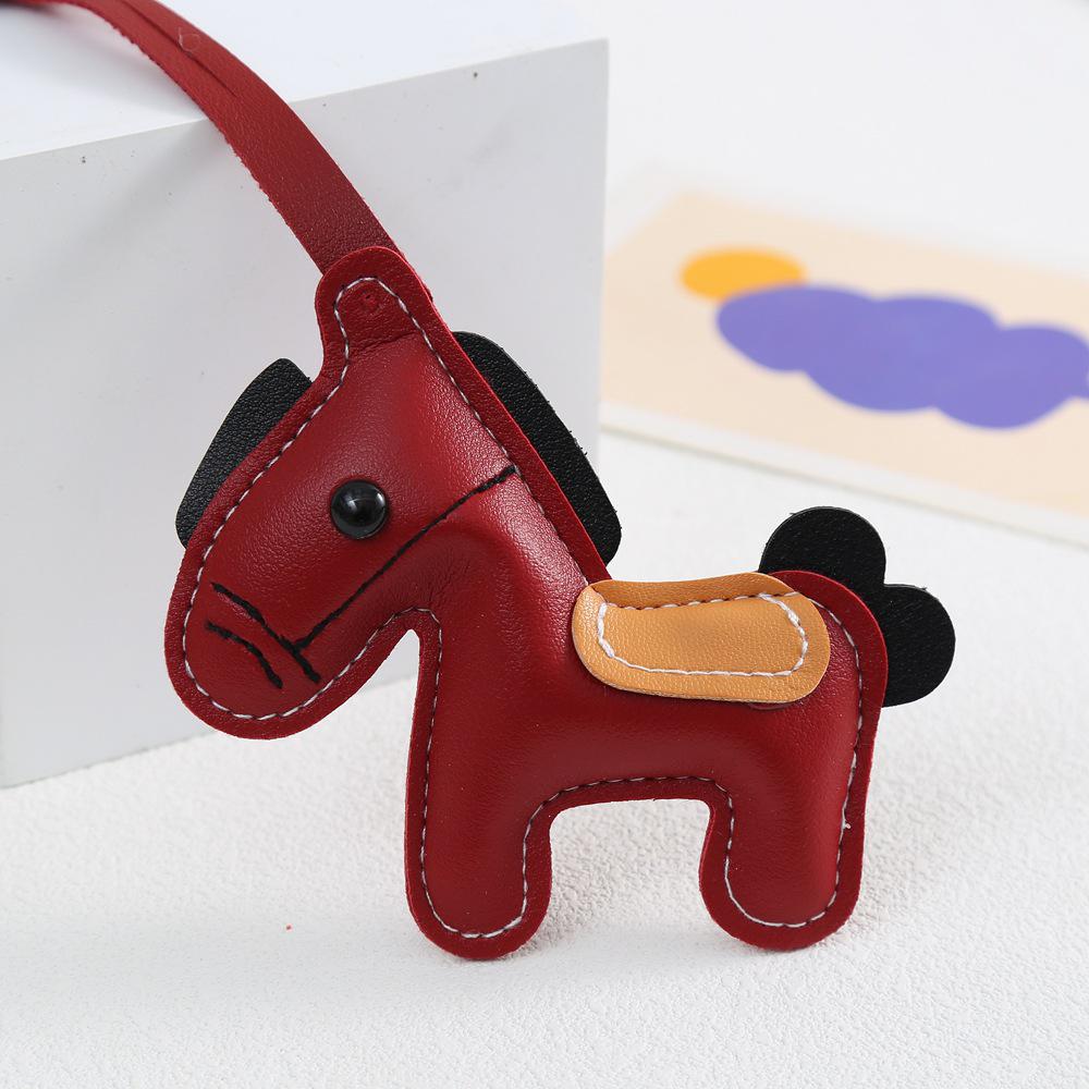 Neuer reicher Stil Lederpuppen-Rucksack Schlüsselanhänger Schmuck